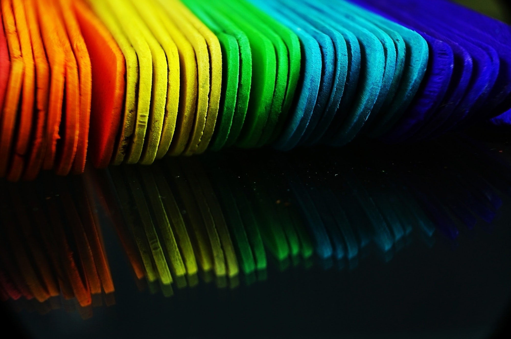 Rainbow abstract macro done with colorful wooden sticks
